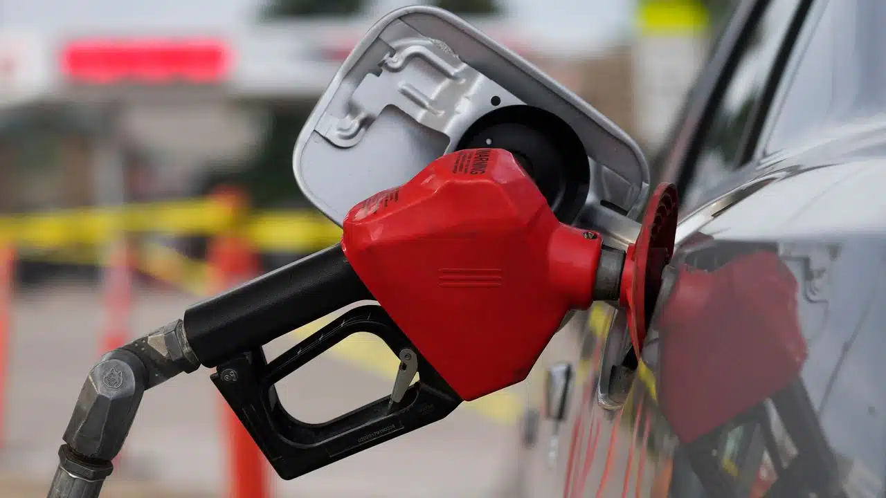 Petrol pump into a car