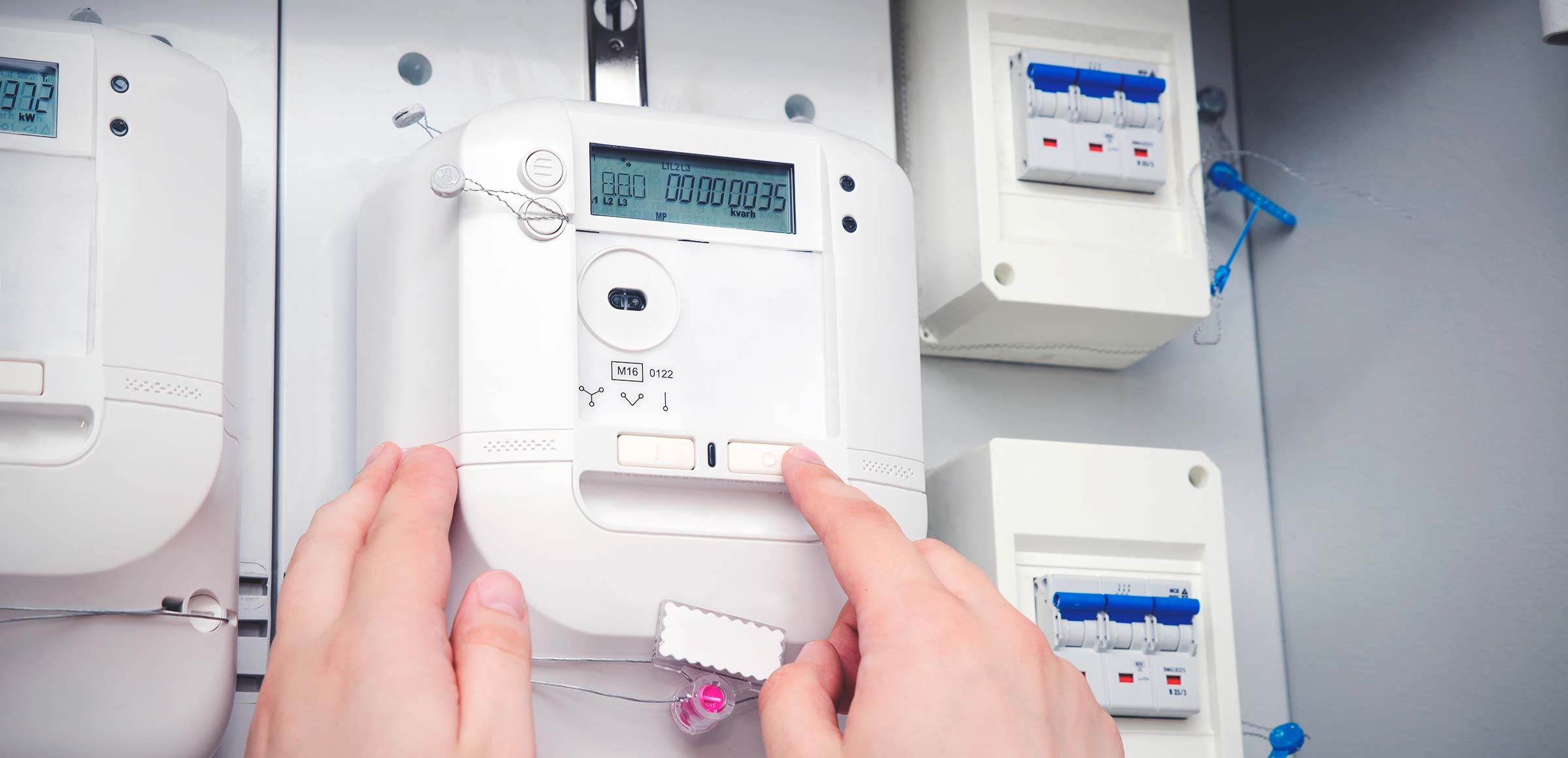 A prepaid meter mounted on the wall