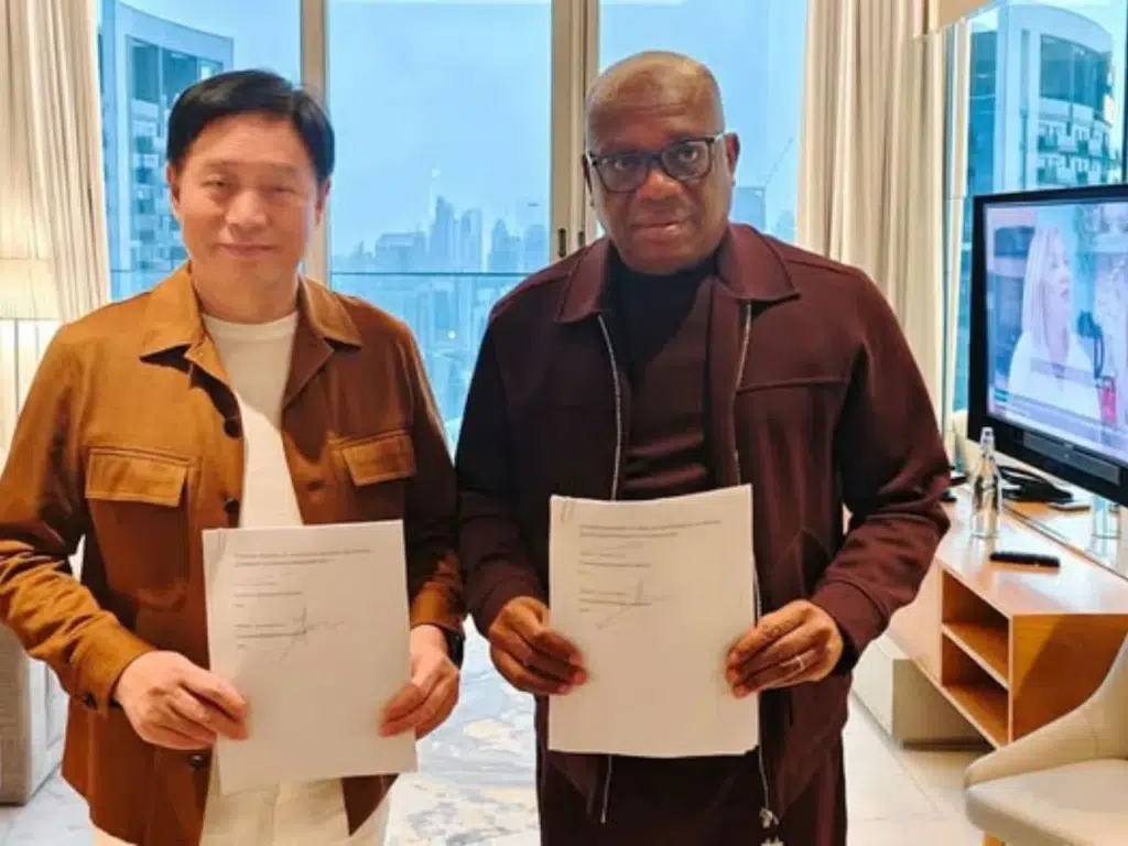 Unnamed senior official from GCL and Nigerian lawmaker, Orji Kalu during the signing of the MOU