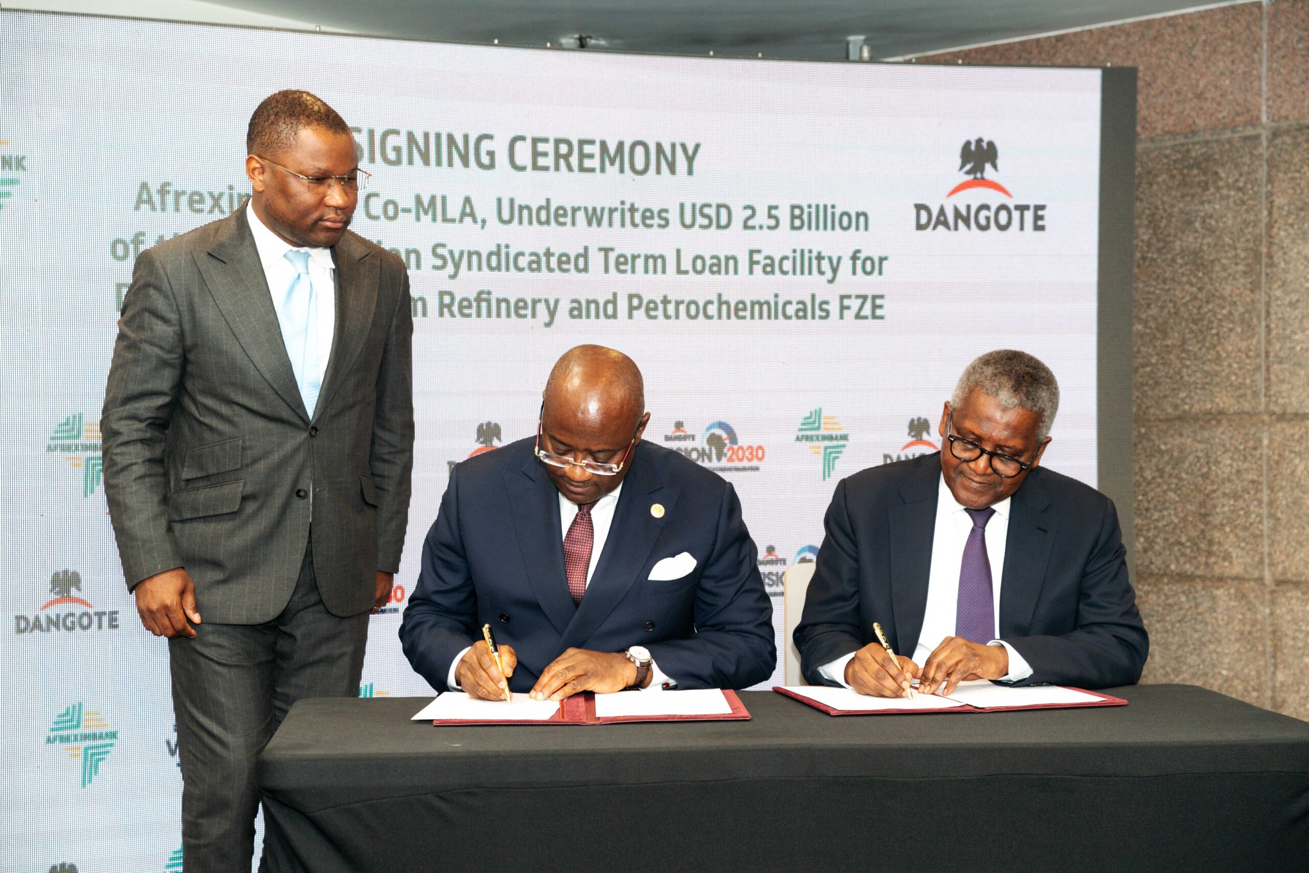 Afreximbank President, Dr. George Elombi and Aliko Dangote during the signing ceremony of the facility.